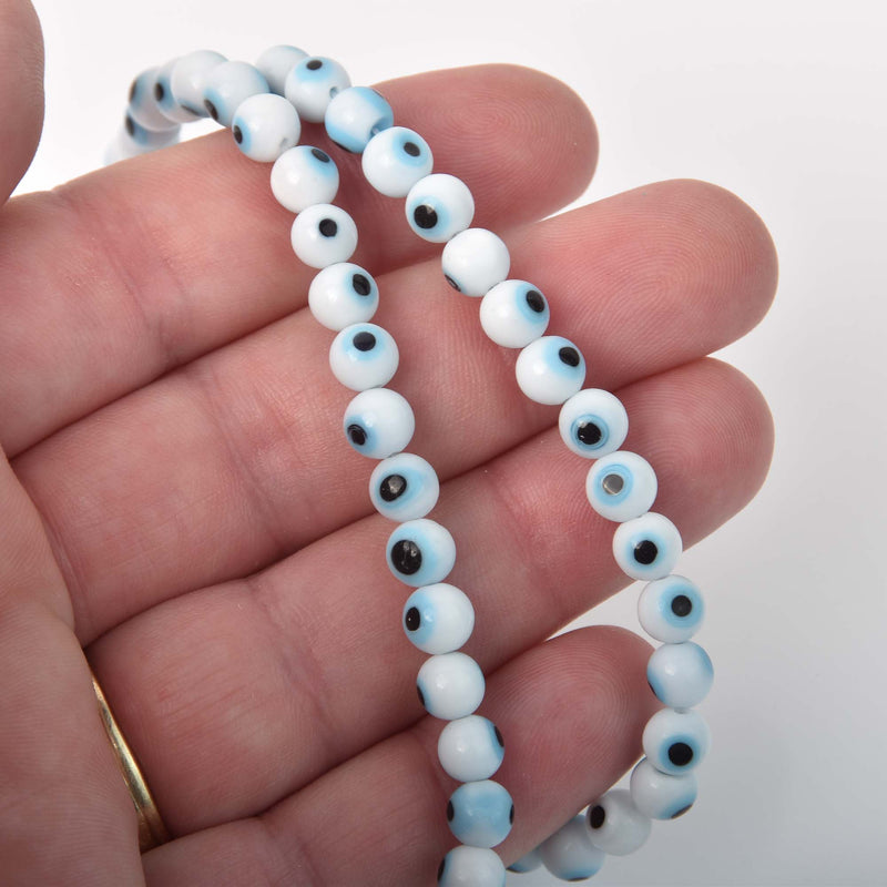 6mm Evil Eye Beads, round glass, white with blue eyes, strand, bgl2101