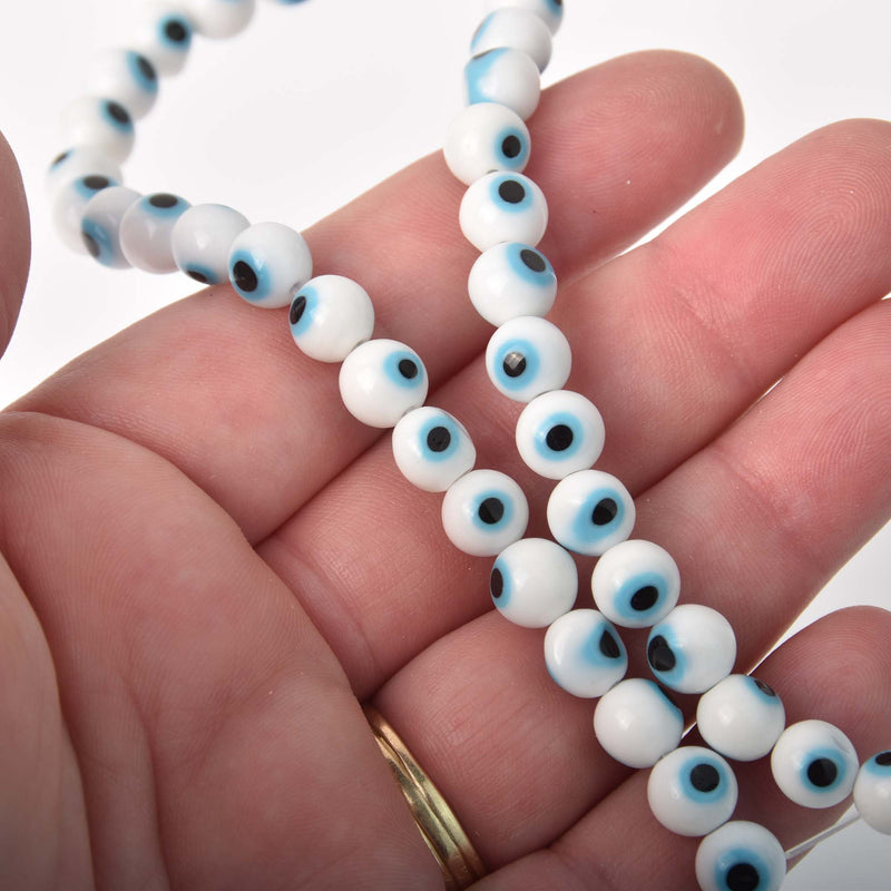 6mm Evil Eye Beads, round glass, white with blue eyes, strand, bgl2101