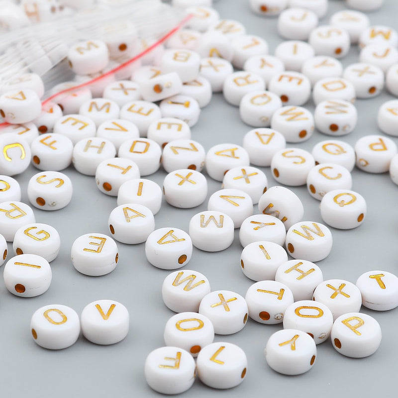 7mm Alphabet Coin Beads, White with Gold Letters, x500 acrylic beads bac0396