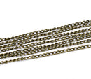 10 meters (over 32 feet)  Antiqued Bronze Oval Curb Link Chain  .  unsoldered links are 4x3mm . fch0100