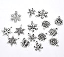 50 Silver Pewter SNOWFLAKE CHARM Pendants . mixed designs, collection as shown . chs1196