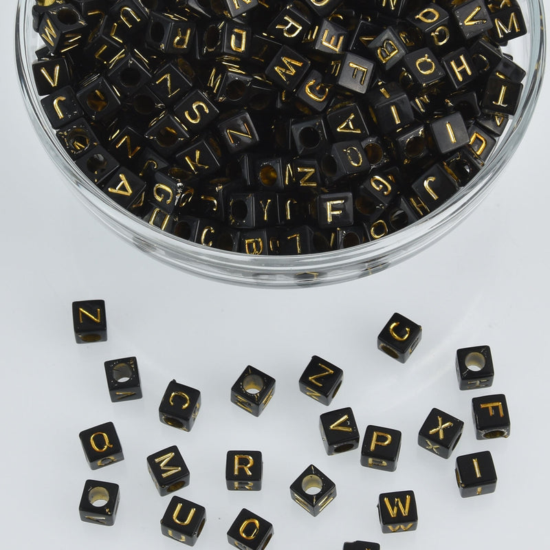 6mm Black Alphabet Cube Beads with Gold Letters, x500 acrylic beads bac0372