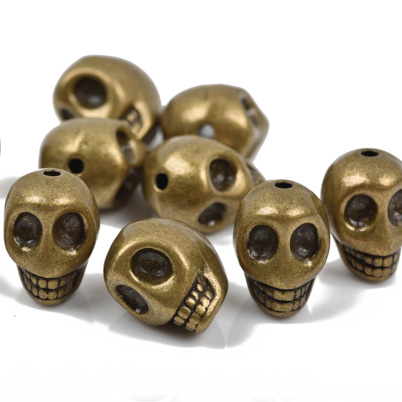 5 Bronze Metal SKULL Beads, drilled top to bottom, 18mm, bme0398