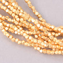2mm Gold Spacer Beads, Faceted, gold plate over copper, bme0748
