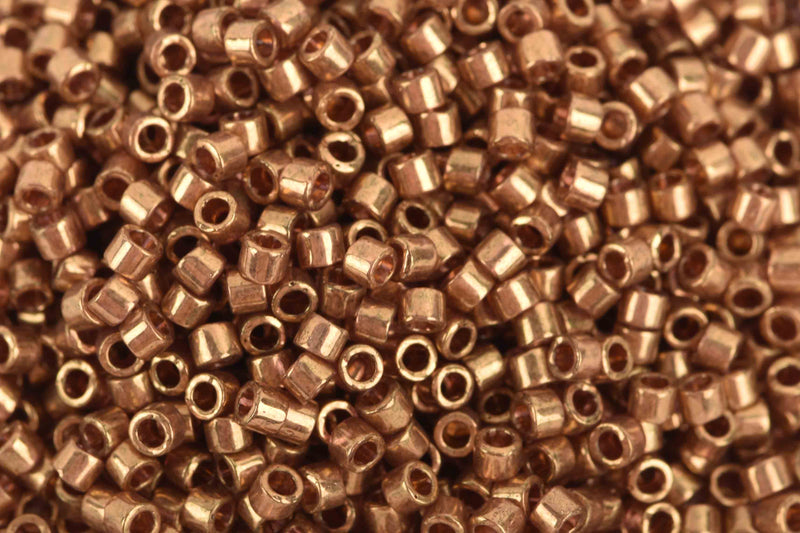 Size 11/0 Miyuki Delica Seed Beads, Trans Luster Metallic Rose Gold, Color DB115, 7.2 grams, bsd0080