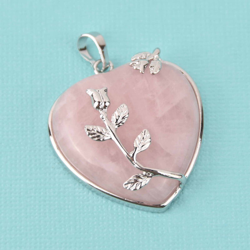 1 Fancy Gemstone Pink Rose Quartz Heart Pendant with silver flower accents and bezel cgm0015