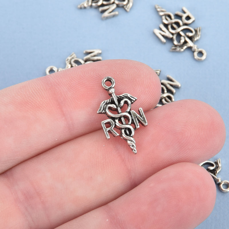 10 Silver Tone RN NURSE Charm Pendants chs0112