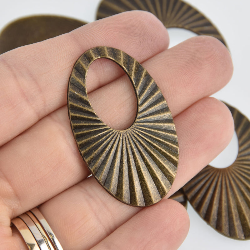 5 Bronze Oval Swirl Charms, Sunburst Design, 1.75" long, chs6701