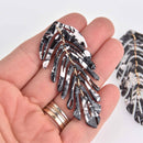 2 Acrylic Leaf Charms, Black and White, moveable segments, 2.75" long, chs7413