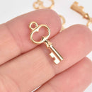 8 Small KEY Charm Pendants, light gold metal,  chs7676