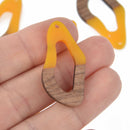 2 Golden Yellow Resin Wood Charms, Twisted Oval, 1.5", chs7838
