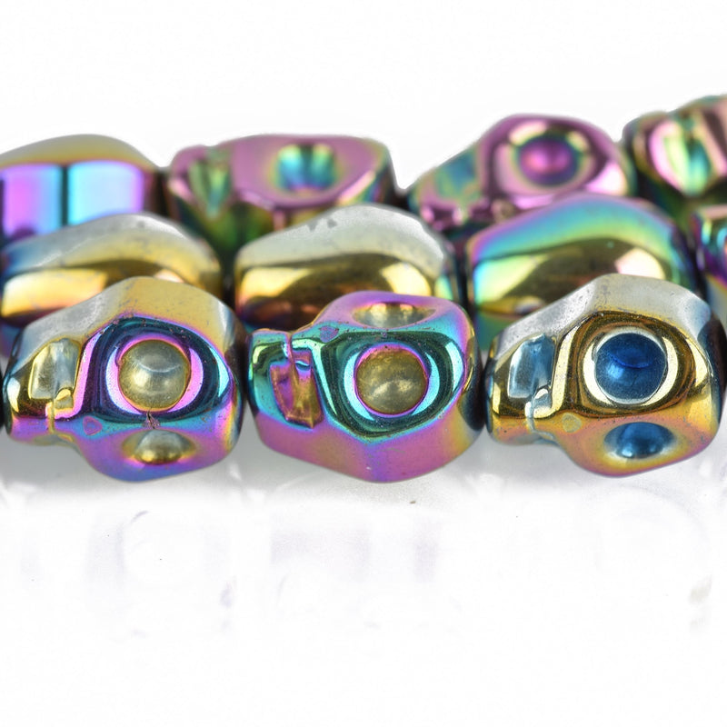 10mm Titanium Coated Rainbow HEMATITE Gemstone SKULL Beads . genuine carved stone . 10x8mm, mardi gras, ghe0192