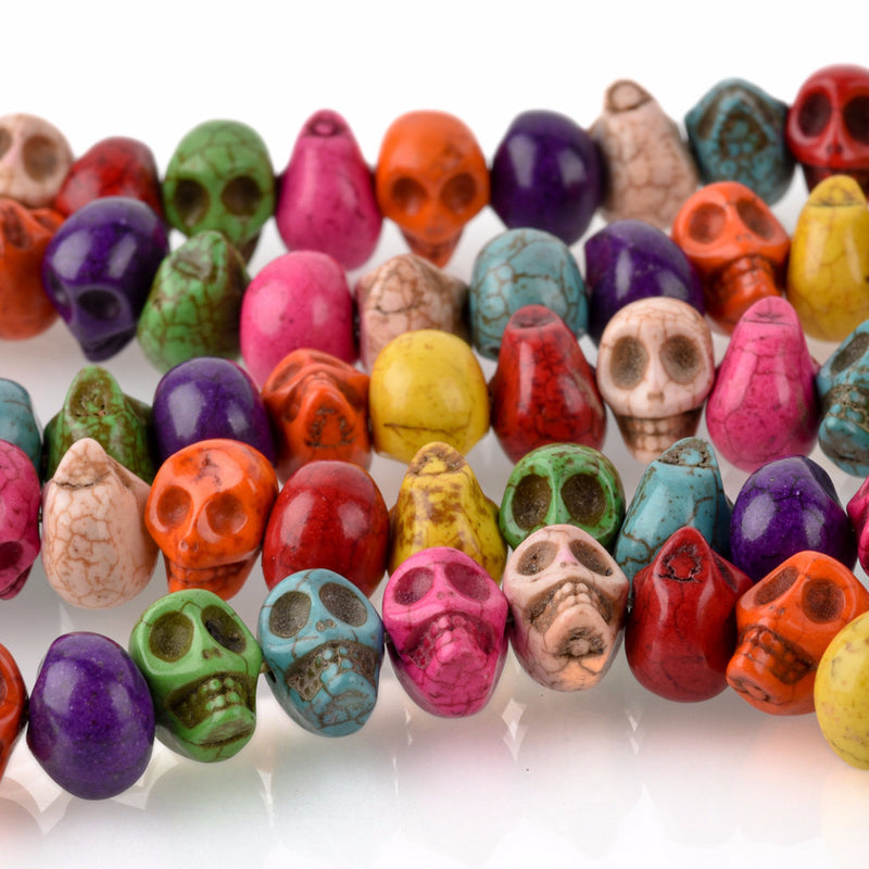 15" Strand Synthetic Turquoise Howlite STONE SKULL Beads . Drilled side-to-side hard to find how0159