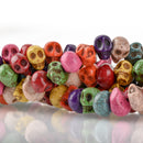 15" Strand Synthetic Turquoise Howlite STONE SKULL Beads . Drilled side-to-side hard to find how0159