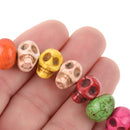 15" Strand Synthetic Turquoise Howlite STONE SKULL Beads . Drilled side-to-side hard to find how0159
