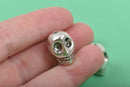 5 Silver Metal SKULL Beads, drilled top to bottom, 18mm, bme0399