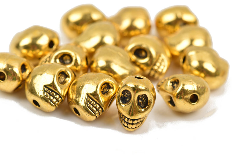 10 Gold Metal SKULL Beads, drilled top to bottom, 12mm, bme0404