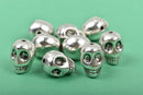 10 Silver Metal SKULL Beads, drilled top to bottom, 12mm, bme0401