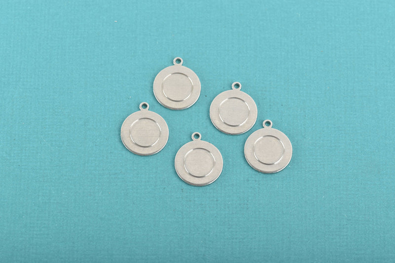 10 Alkeme™ Border Circle Disc Charm, silver metal stamping blanks with top loop, 13mm (1/2") 18 gauge, msb0440