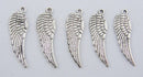 10 Medium Antique Silver Metal ANGEL or BIRD Wing charm pendants . 10x30mm chs0702