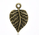 10 Antique Bronze Metal LEAF Charm Pendants. CHB0120