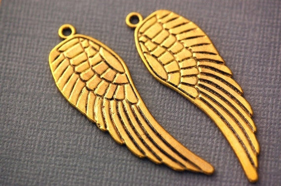 4 Large Antique Gold ANGEL or BIRD Wings Pendants .  reversible design  2" long . Chg0079