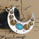 CRESCENT MOON Pendant, Silver with gold flowers and turquoise blue cabochon, textured metal, 2-3/4" chs2702