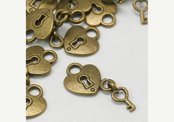 10 Bronze Metal Moveable LOCK and KEY Heart Charm Pendants.  chb0056