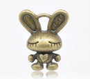 10 Medium Antique Bronze Tone BUNNY RABBIT Charm Pendants.  Chb0179