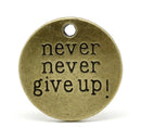 10 pc.  Antique Bronze Tone Metal Stamped Never NEVER GIVE Up Circle Charm Pendants . chb0256