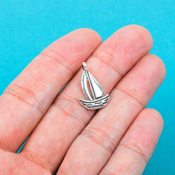 10  Silver Tone Metal SAILBOAT Charm Pendants 13mmx19mm  chs0181