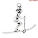 4 SKIER Antique Silver Tone Metal Charm Pendants . (one sided, flat back design)  chs0590