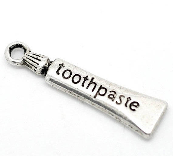 10 Silver Tone TOOTHPASTE TUBE Charm Pendants . chs1157