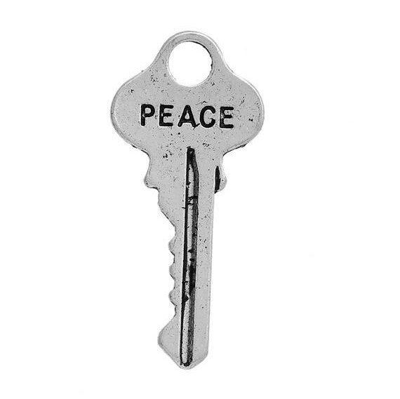 10 Small Silver PEACE KEY Charms, Antiqued Silver Metal with Peace stamped on one side, 25x12mm, chs2777
