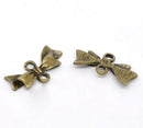 10 Small Antique Bronze BOW 2-Hole Connector Charm Pendants. CHB0073