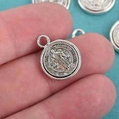 silver religious medal charm