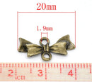 10 Small Antique Bronze BOW 2-Hole Connector Charm Pendants. CHB0073