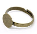 10 Antique Bronze metal Ring Base Blank . Glue-on . Size 8 adjustable. fin0264