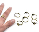 10 Antique Bronze metal Ring Base Blank . Glue-on . Size 8 adjustable. fin0264