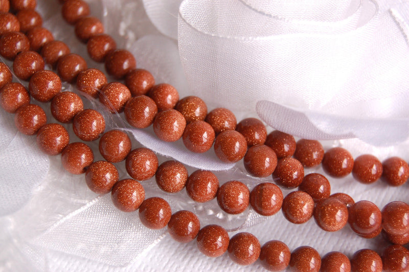 GOLDSTONE Round Beads 6mm, strand . about 65 beads ggs0005