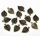 10 Antique Bronze Metal LEAF Charm Pendants. CHB0120