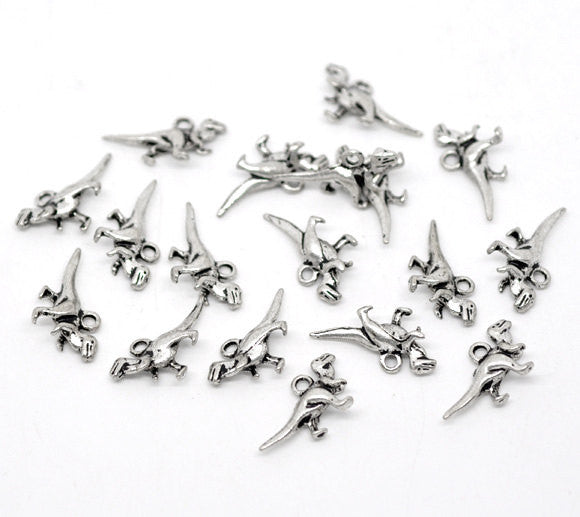 Silver Metal DINOSAUR CHARMS or Pendants . 10 pieces  chs0826
