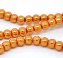 6mm PUMPKIN ORANGE Round Glass Pearls . long 32" strand . about 145 beads  bgl0415