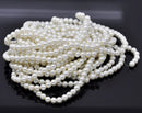 6mm OFF WHITE IVORY Round Glass Pearls . long 32" strand . about 145 beads bgl0015