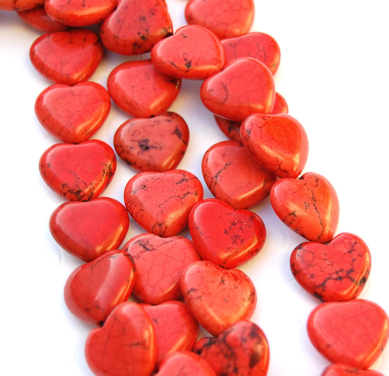 GEMSTONE PUFFY HEART Beads made of Carved Howlite . 5 pieces . Light Red 20x20mm how0347