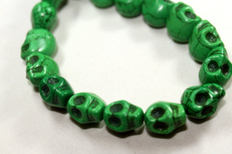 1 Strand GRASS GREEN Sugar Skulls Howlite Gemstone Beads . approx 32 beads . carved stone  12mm how0146