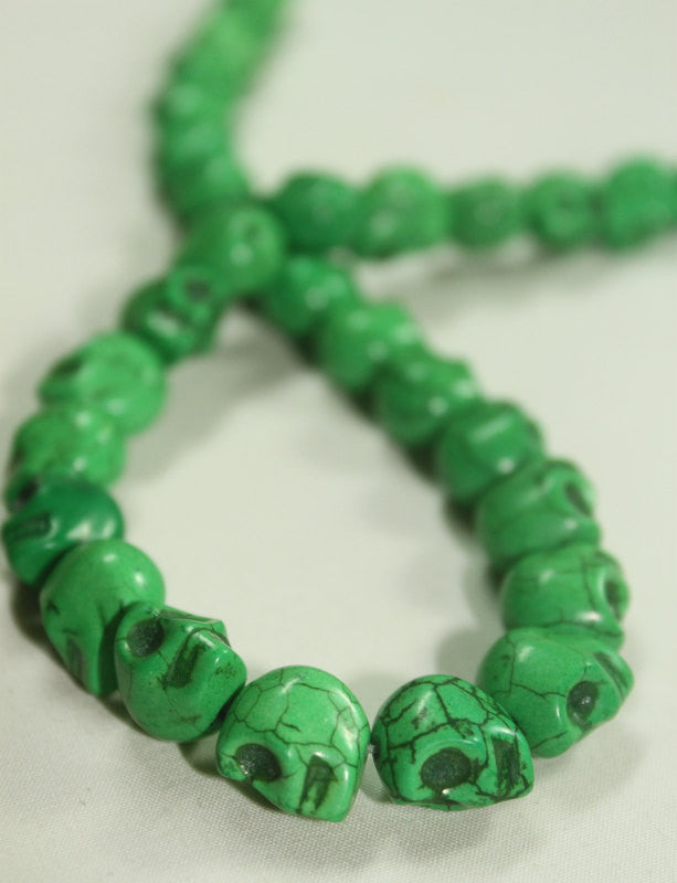 1 Strand GRASS GREEN Sugar Skulls Howlite Gemstone Beads . approx 32 beads . carved stone  12mm how0146