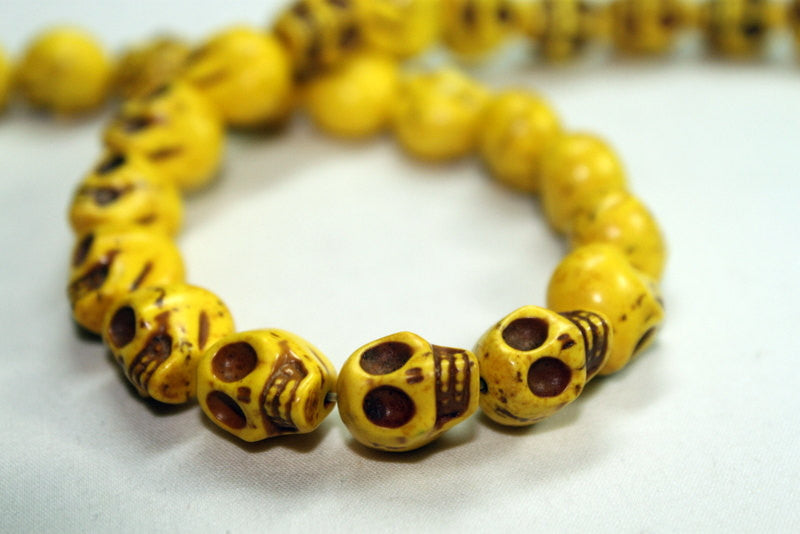 1 Strand LEMON YELLOW Sugar Skulls Howlite Gemstone Beads . approx 32 beads . carved stone  12mm HOW0149