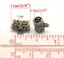10 Antiqued Bronze Tone Pewter Swirl Filigree Pattern Tube Spacer Beads with Bail  .  11x5mm FBA0007