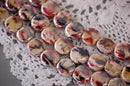 1 Strand  CRIMSON Red, Tan and BLACK Ceramic Porcelain COIN Beads . approx 20 pearlized beads . carved  16-17mm  bgl0640
